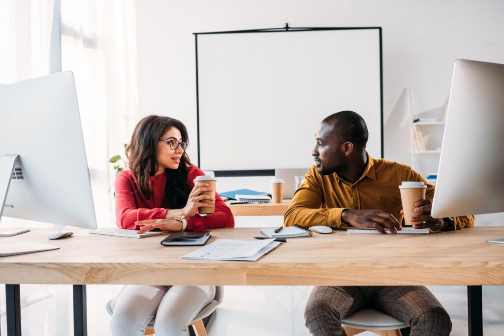 portrait of african american business people at workplace in office